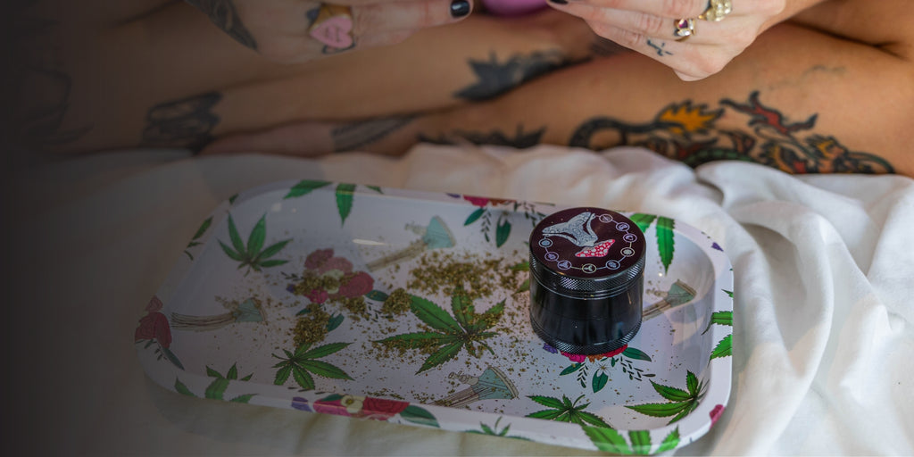 Woman preparing a blunt with cannabis